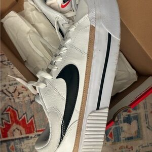 Nike Black and Orange Court Legacy Sneakers
Only worn twice